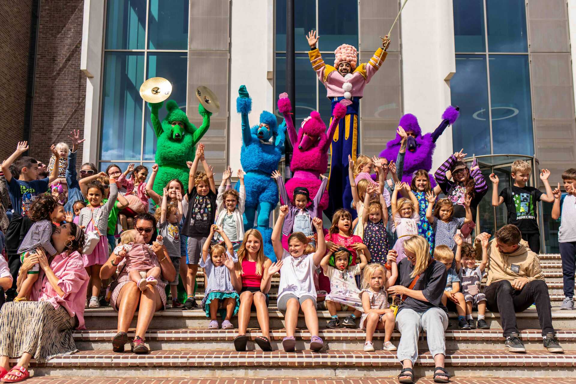 Two students looking to the horizon from a bench within the Cathedral grounds