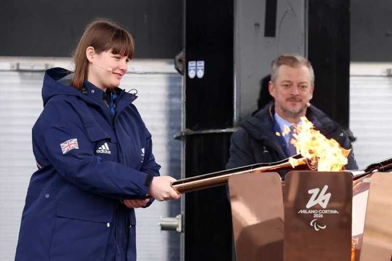 Four-time Paralympic medallist and Newman alumna Millie Knight lighting the Paralympic Flame