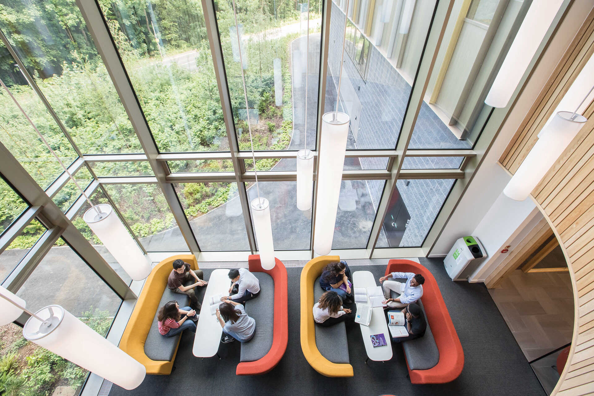 An overhead view of students on sofas in the Sibson building