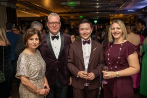 Emma Marku poses for a photo with three others at the awards
